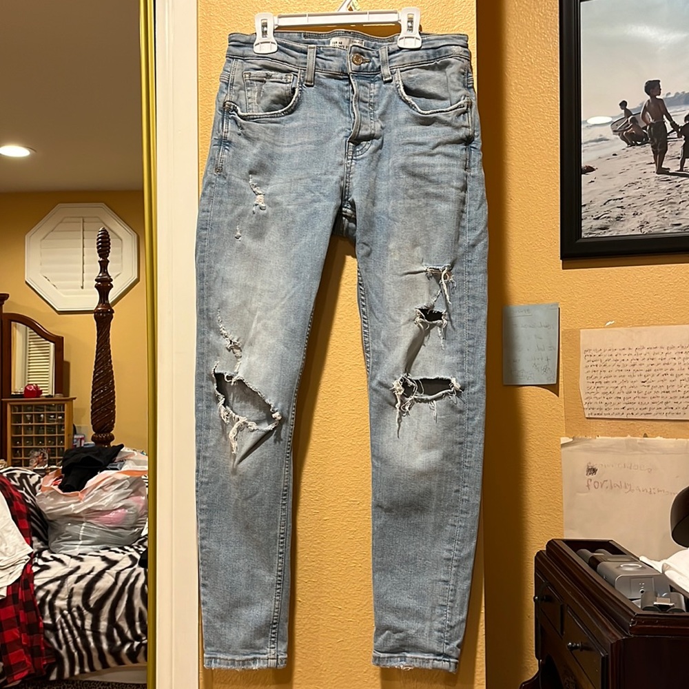 Zara Men’s washed and ripped jeans